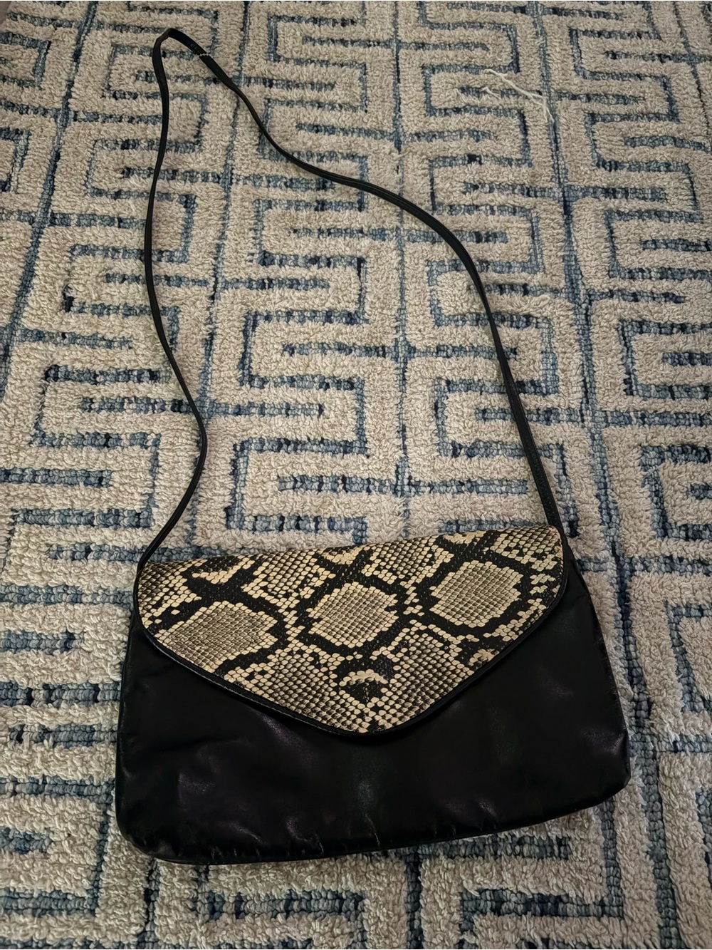 Black Leather Crossbody Bag with Snake-Print Flap